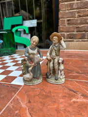 Pair of Ceramic Farmer Couple Figurines
