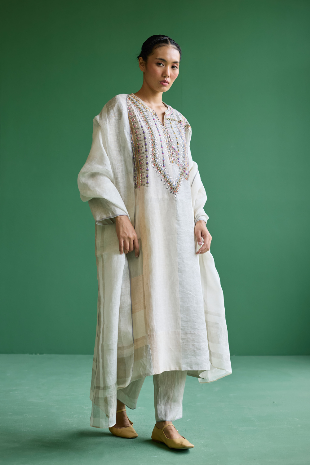 Rida Hand-Embroidered Kurta Set
- Ivory linen by Manan in ivory color for women Worldwide