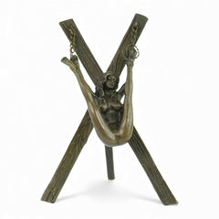 Bronze erotic bondage sculpture of a female nude suspended on a cross