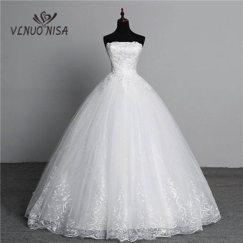 Abito da sposa elegante con gonna senza spalline e senza maniche con ricami in pizzo - Bridetobe.it