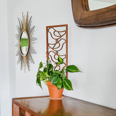 Modern indoor plant trellis for small houseplants.