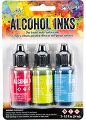 Packaging of Tim Holtz Alcohol Inks with three bottles on a colorful background