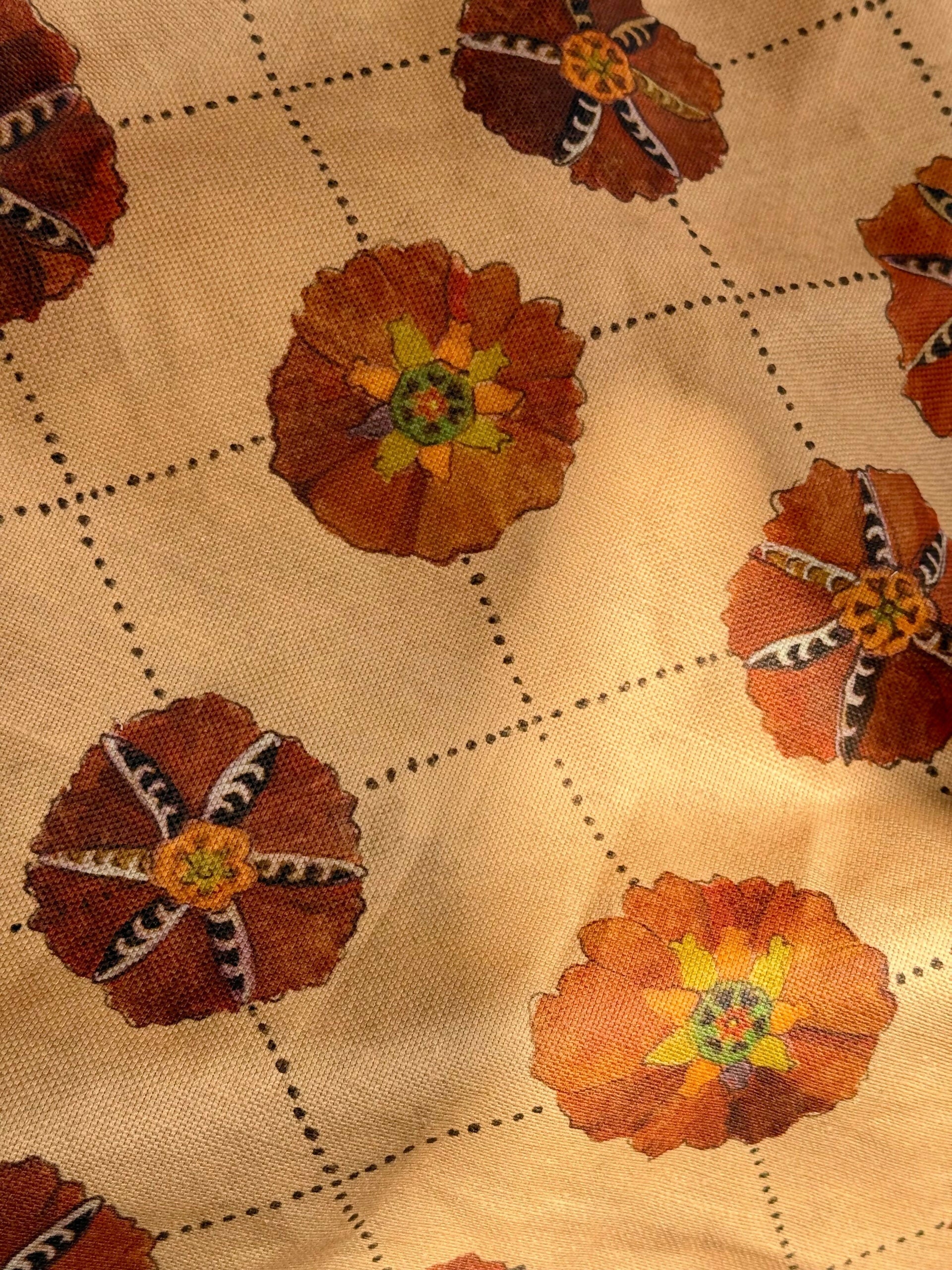 A piece of suzani fabric with floral patterns in beige, brown, and multicolor hues, available to buy on the-salon.com. SALON curates the finest , unique, handmade pieces from the interior industry's best makers and brands. Shop luxury furniture, lighting, rugs, art, antiques and vintage pieces and accessories from SALON interior designed rooms.