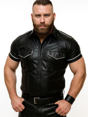 Gay leather uniform shirt with white piping, short sleeves, and chest pockets — BLUF-inspired fetish shirt by Leather Gear.