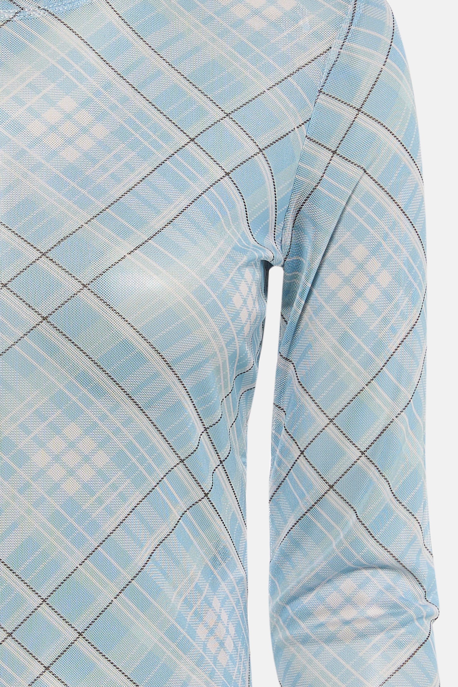 Blauw T-shirt met lange mouwen van JDY, met geruit patroon en doorschijnende stof.
