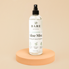 Bottle of Bare Botanics aloe mist on a beige background
