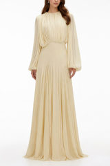 Pale yellow maxi dress with a ruched bodice, high round neckline, and long bishop sleeves