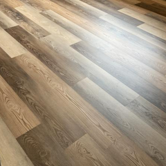 Style Selections Catskill Pine 5-mm x 7-in W x 48-in L Waterproof Interlocking Luxury Vinyl Plank Flooring (23.21-sq ft/case)