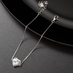 Gourmette argent rhodié tendance avec un motif cœur blanc
