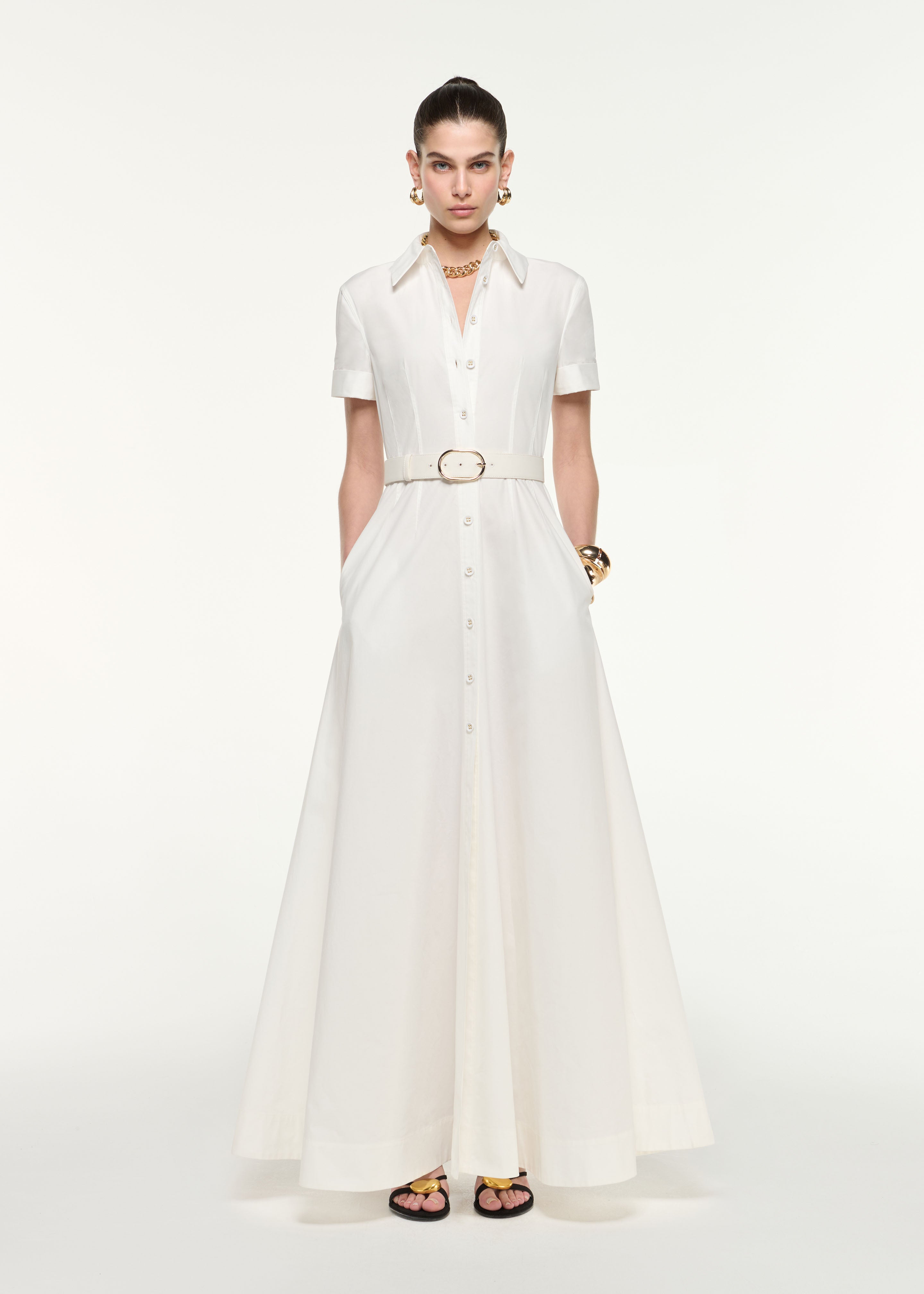 Front view of a model wearing the Shirt Dress Gown in White