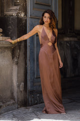 Striped cutout maxi dress with elegant accents, a vacation maxi dress essential.