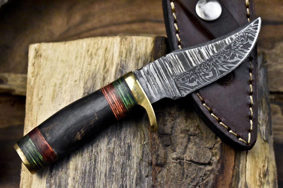 Twist Damascus Skinner Knife with Ram's Horn Handle and Brass Guard