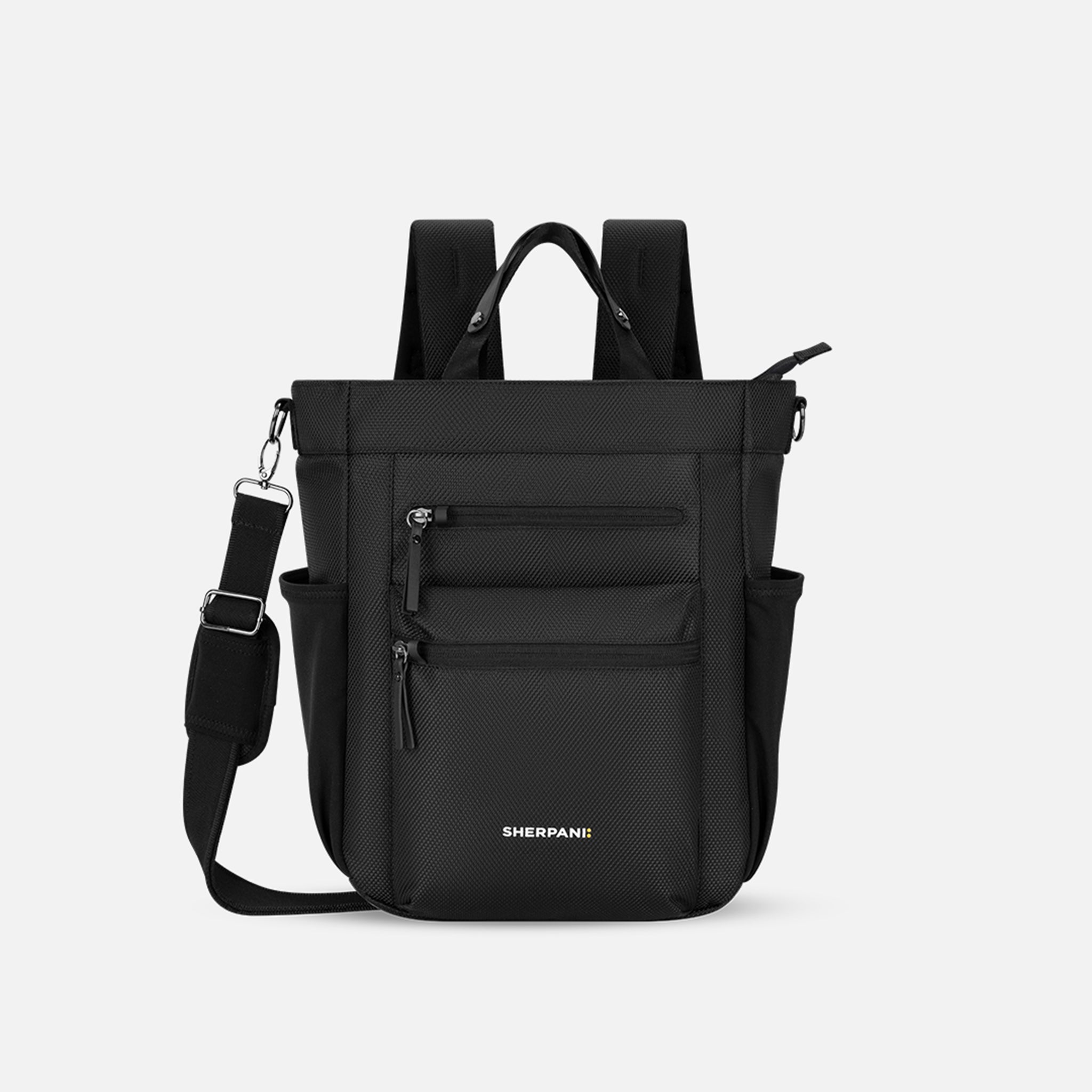 A Sherpani Soleil Carbon Black Anti-theft Multi-Wear Travel Bag, front view showing lockable pockets and straps on white backdrop. #color_carbon-black