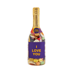 Champagneflaske fyldt med farverigt slik med teksten I LOVE YOU på etiketten. Gaveidé fra SlikEkspressen.