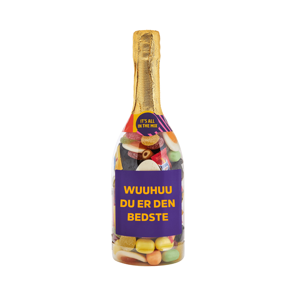 Champagneflaske fyldt med farverigt slik med teksten WUUHUU DU ER DEN BEDSTE på etiketten. Gaveidé fra SlikEkspressen.