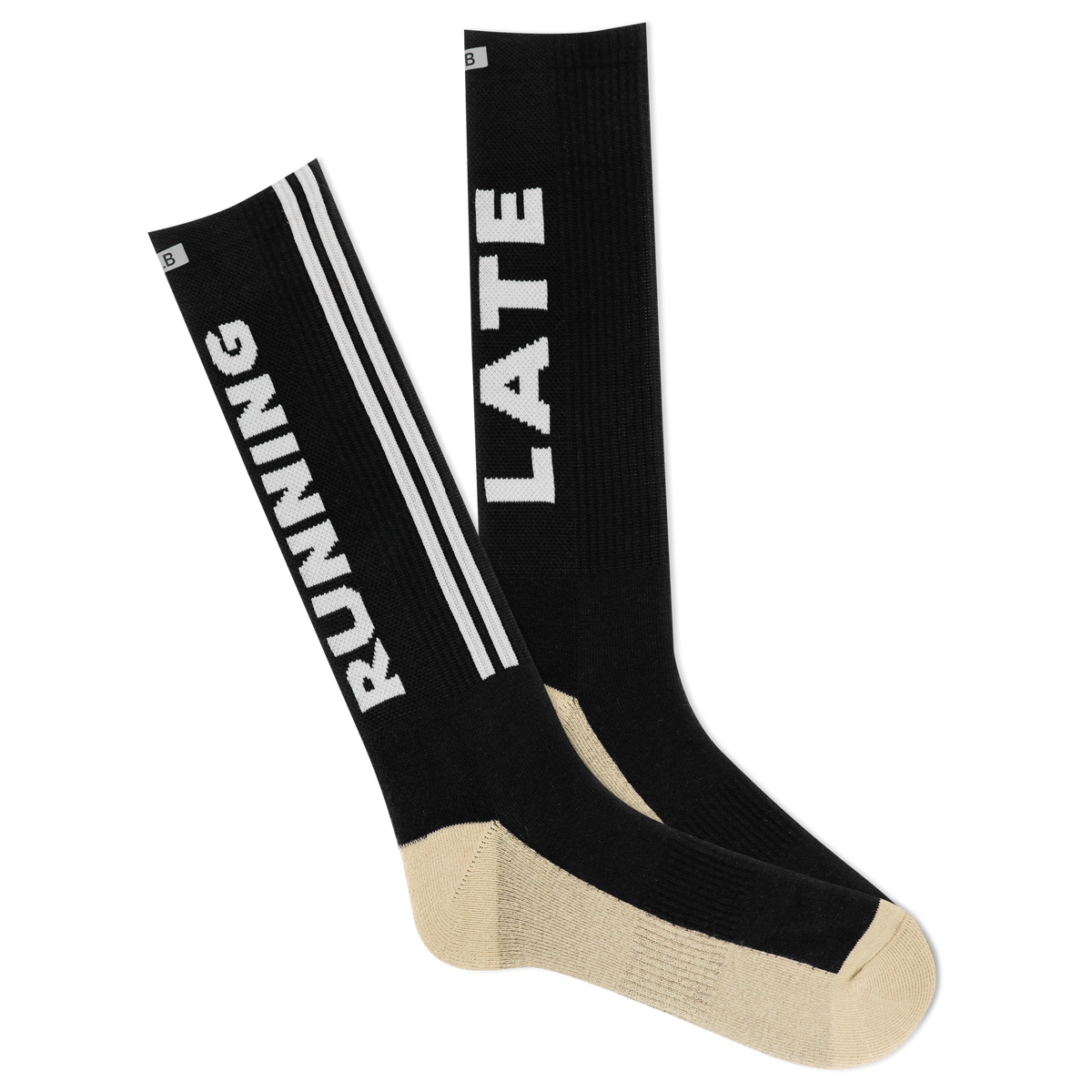 A pair of black and beige crew socks with 'RUNNING LATE' text and stripes.