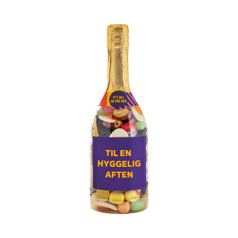 Champagneflaske med slik og etiketten "Til en hyggelig aften" – fyldt med Favorit Mix fra SlikEkspressen.